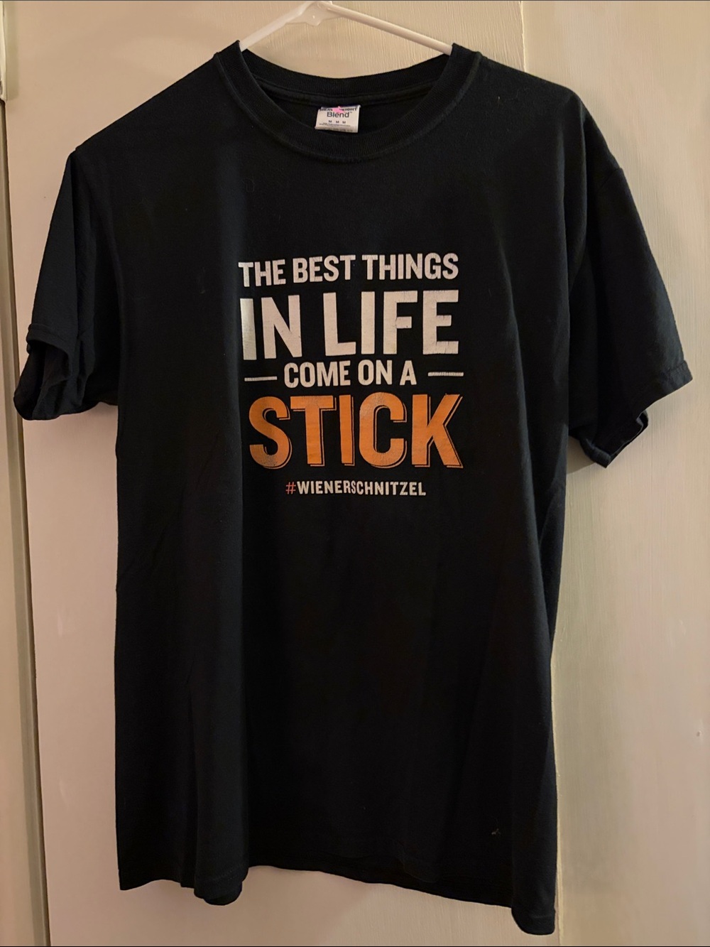 Wienerschnitzel Black Graphic Tee - 'The Best Things In Life Come On A Stick'